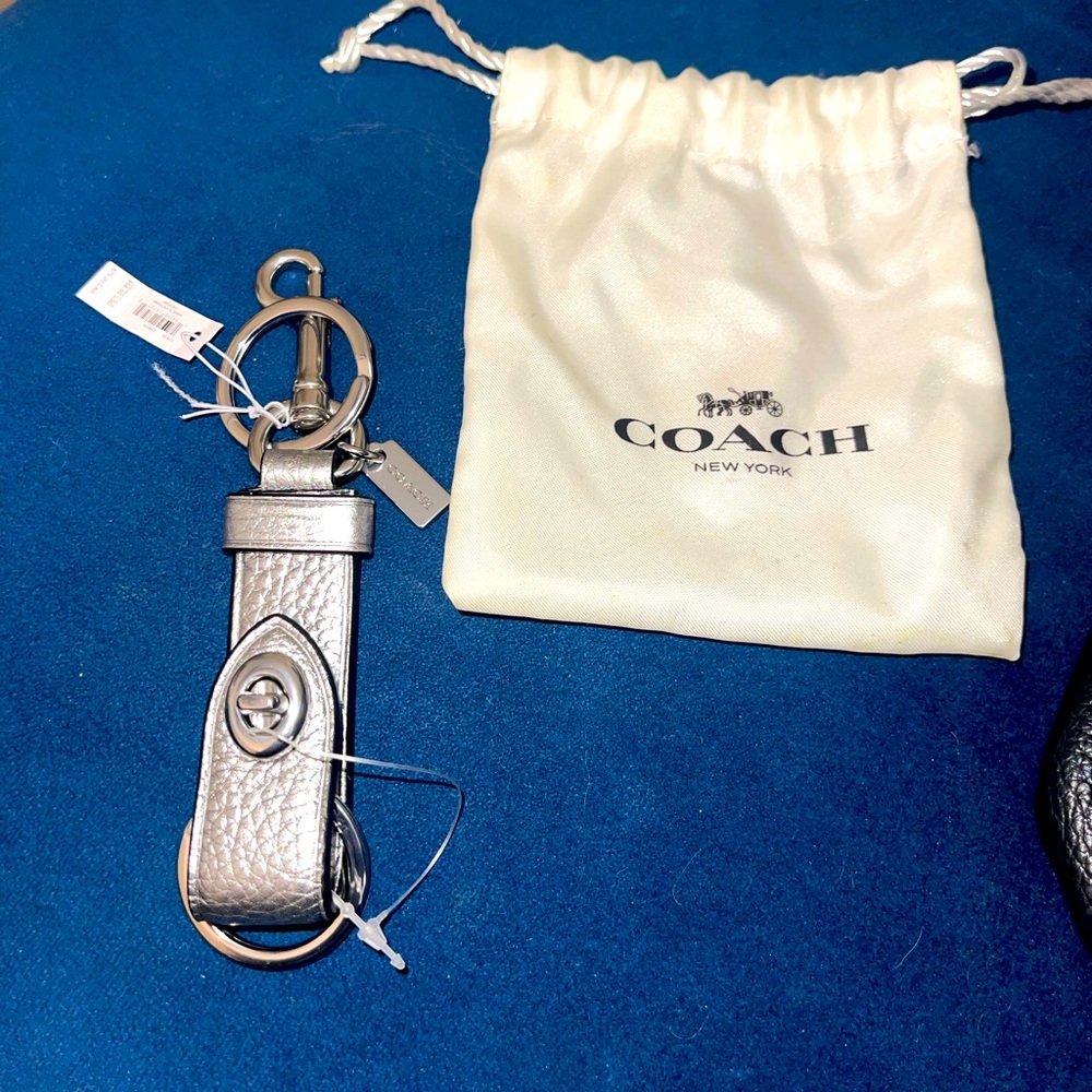 Coach trigger snap bag charm -silver/metallic ash color